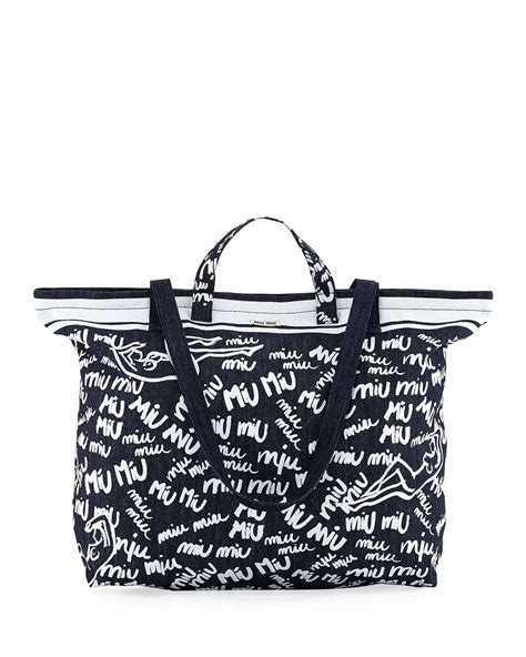 miu miu printed denim tote|Printed denim bag with embroidered logo .